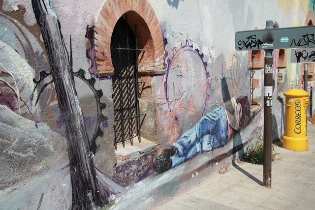 A Wall With Graffiti On It Next To A Yellow Fire Hydrant Graffiti