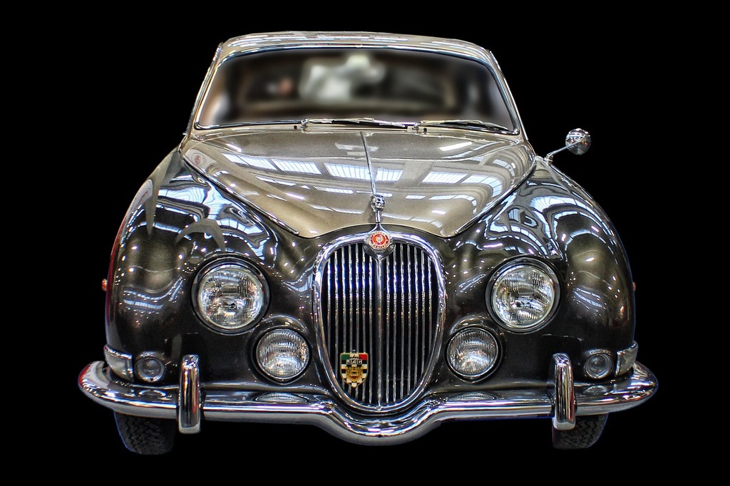 A classic car is shown in a black background. Auto vintage vintage car. -  PICRYL - Public Domain Media Search Engine Public Domain Image