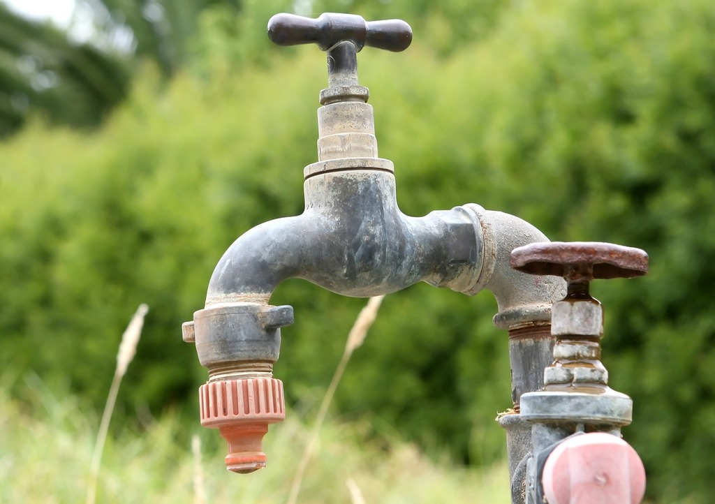 A water faucet with a spigot attached to it. Background clean connection,  backgrounds textures. - PICRYL - Public Domain Media Search Engine Public  Domain Image