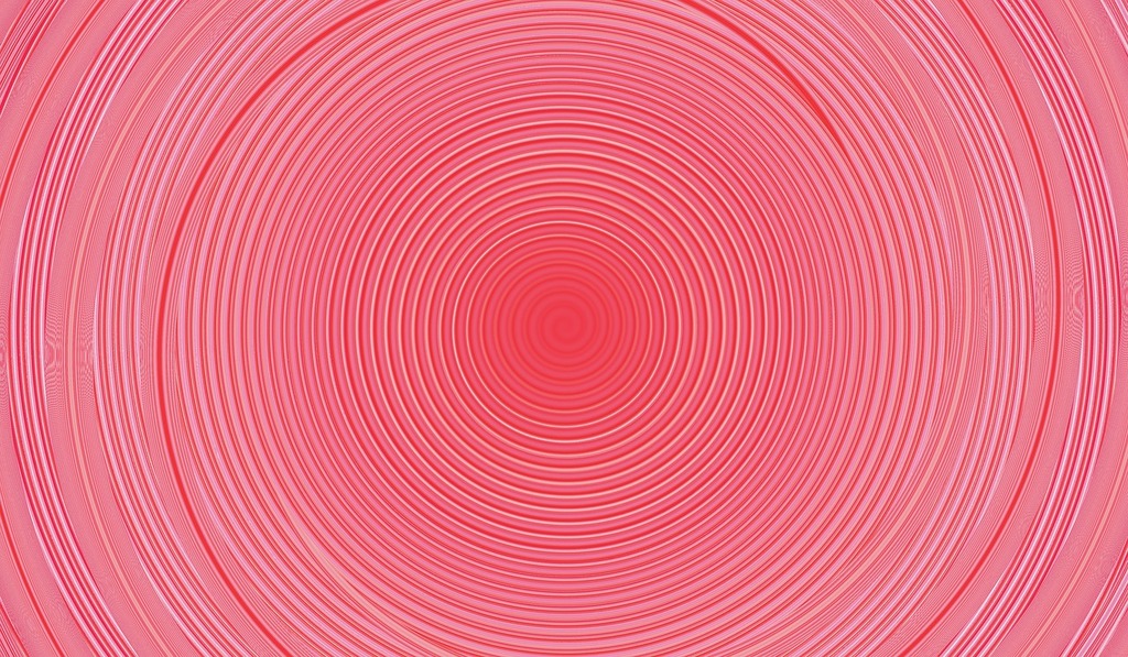 A red background with a circular design. Background pink abstract