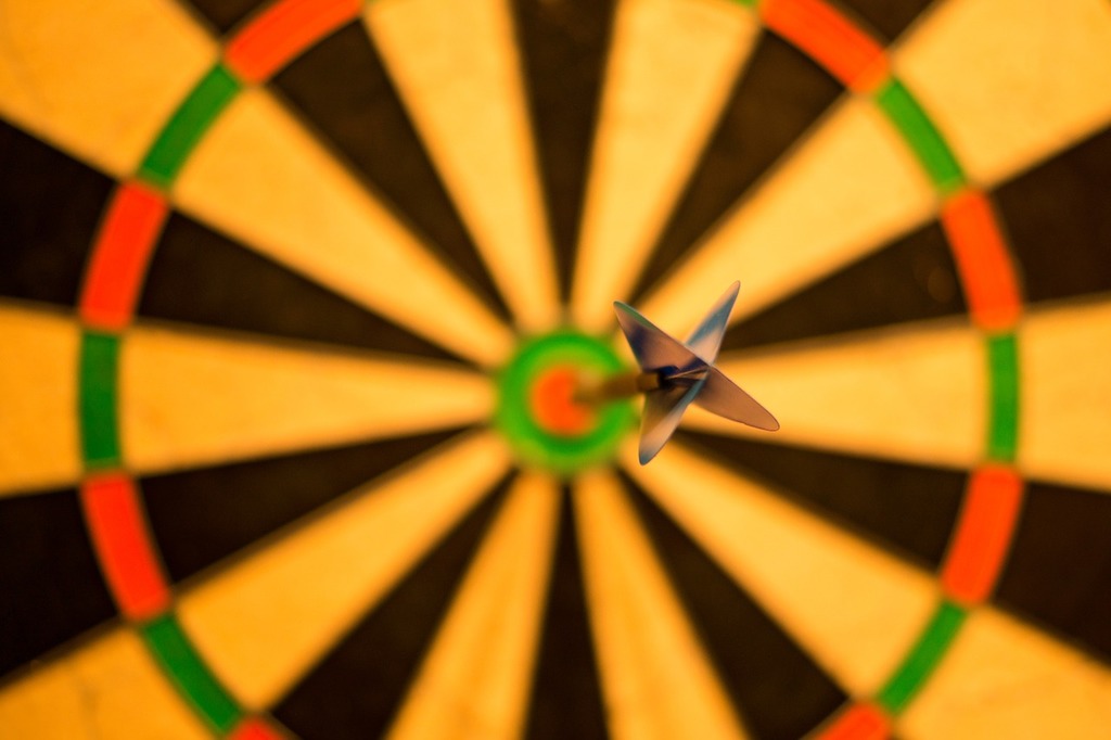 A dart in the center of a dart board. Bulls eye bull darts, sports. - PICRYL - Public Domain Media Search Engine Public Domain Image