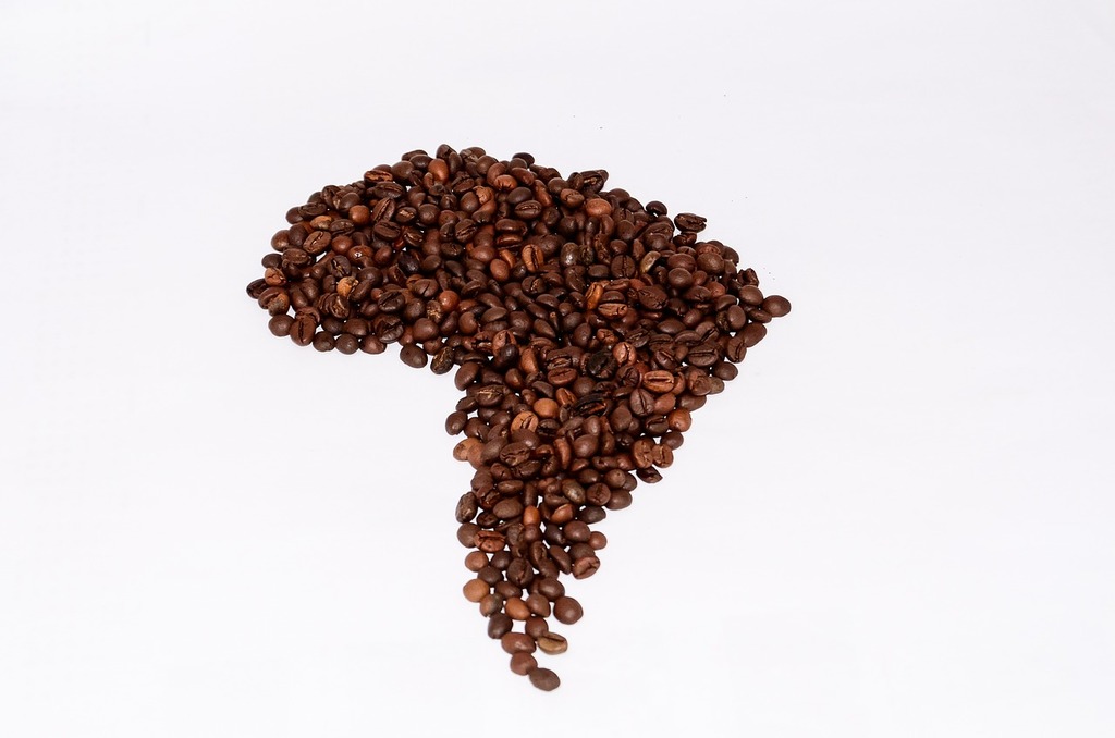 A silver coffee pot sitting on top of a pile of coffee beans. Coffee tea old  coffee maker, food drink. - PICRYL - Public Domain Media Search Engine  Public Domain Search