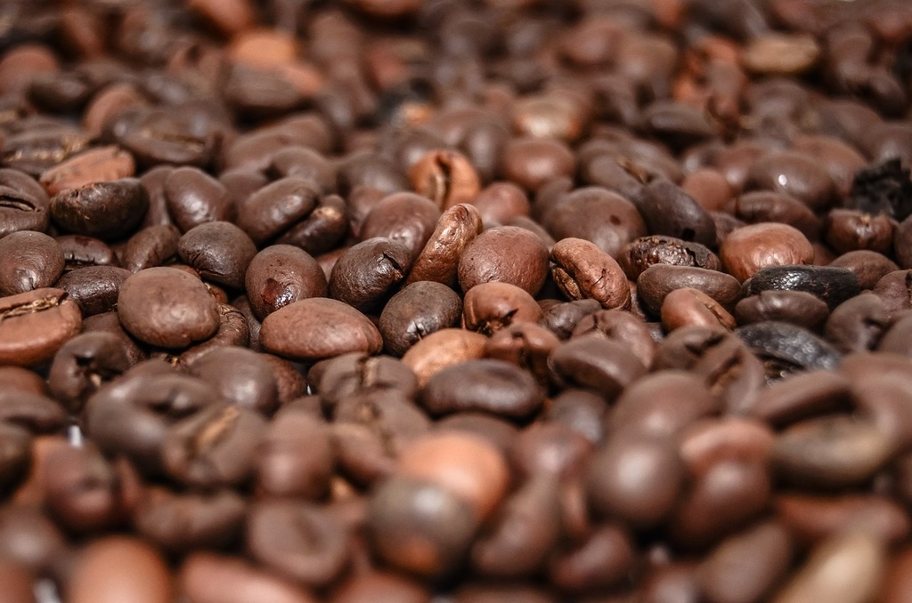 A silver coffee pot sitting on top of a pile of coffee beans. Coffee tea old  coffee maker, food drink. - PICRYL - Public Domain Media Search Engine  Public Domain Search