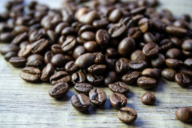 A silver coffee pot sitting on top of a pile of coffee beans. Coffee tea old  coffee maker, food drink. - PICRYL - Public Domain Media Search Engine  Public Domain Search