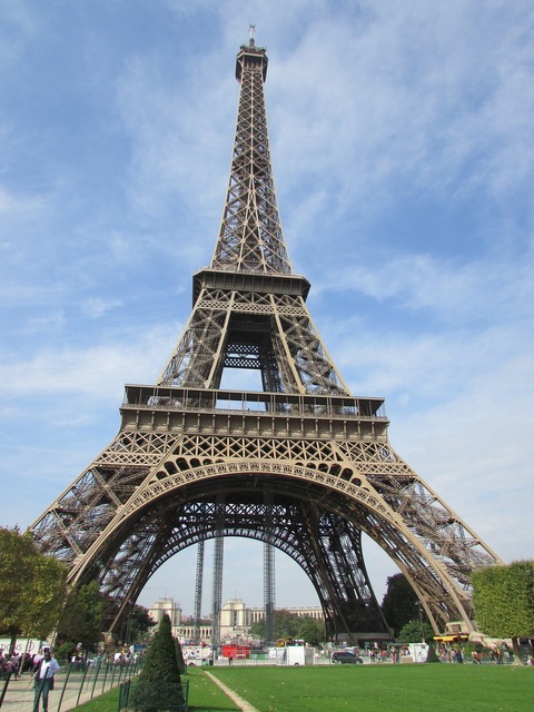 Eiffel tower paris france. The eiffel tower stands tall in a park ...