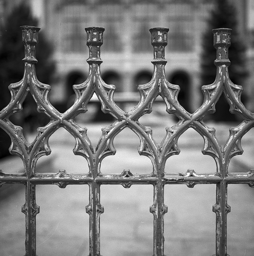 Fence steel metal building. A black and white photo of a fence - PICRYL ...