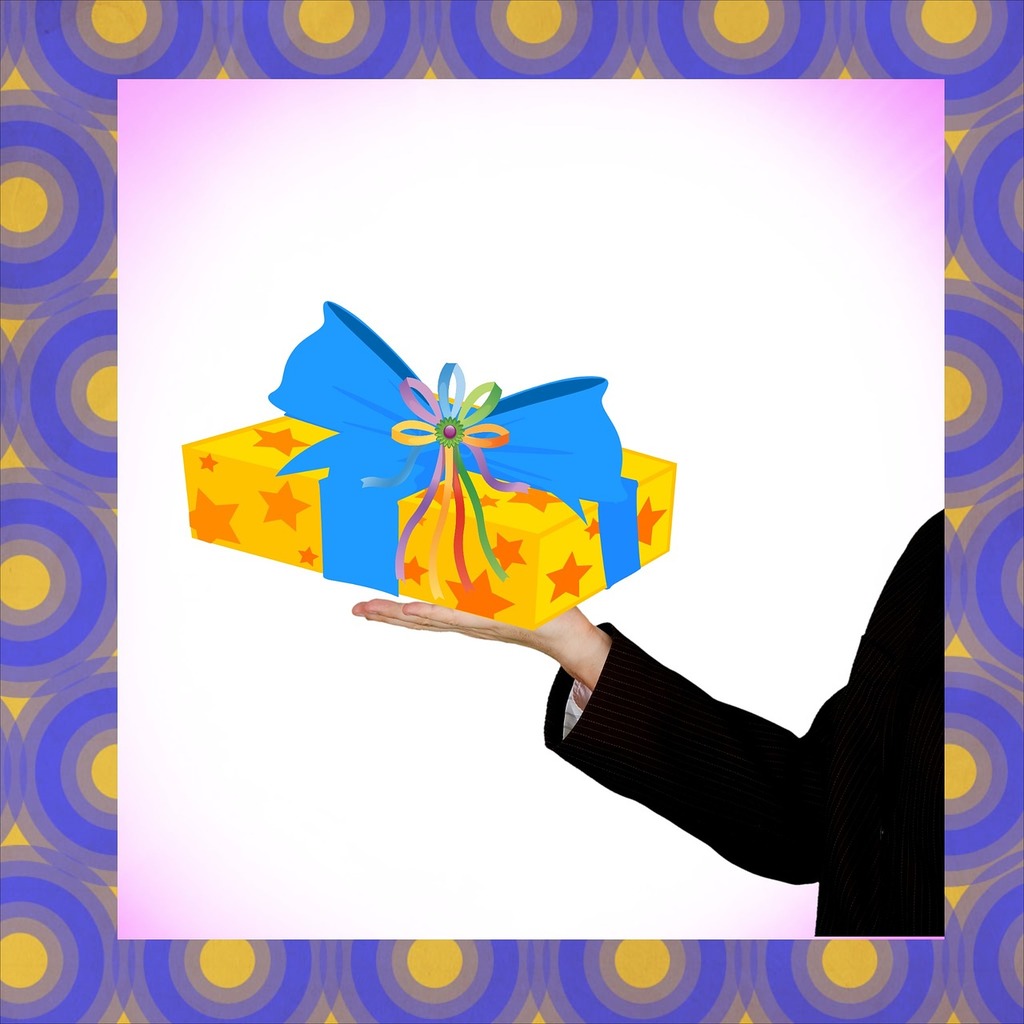 A person holding a blue and yellow gift box. Gift promo don, work. - PICRYL  - Public Domain Media Search Engine Public Domain Image