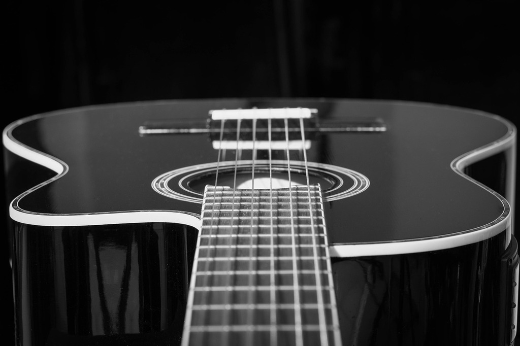 black acoustic guitar photography