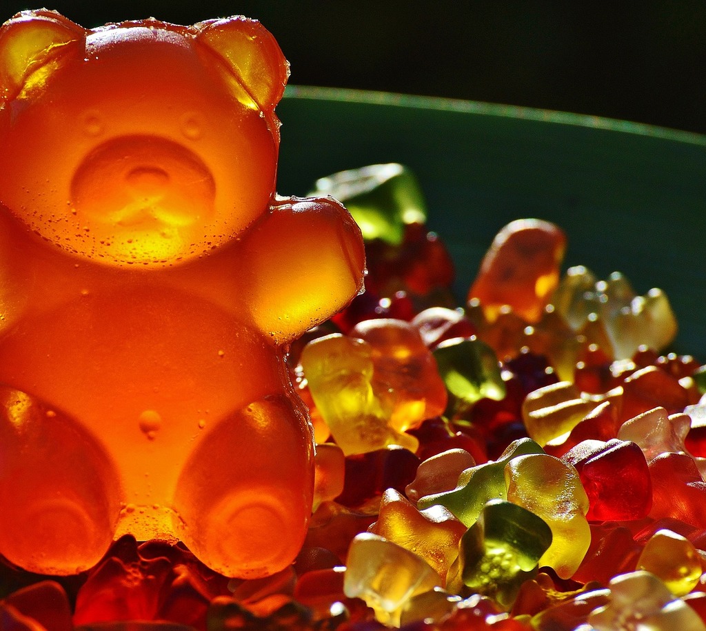 a-close-up-of-a-gummy-bear-in-a-bowl-gummib-rchen-giant-rubber-bear