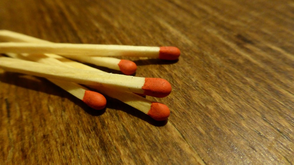 Some Stick Matches on a Wooden Table Stock Photo - Image of still,  vertical: 119307036