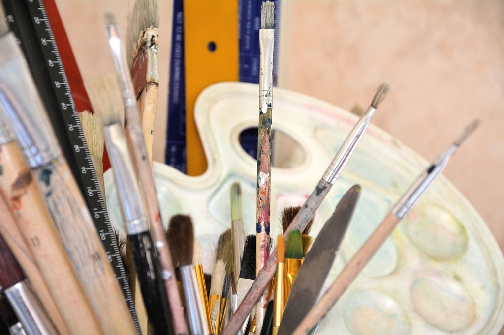 A white table topped with paint and brushes. Paint brushes painting. -  PICRYL - Public Domain Media Search Engine Public Domain Image