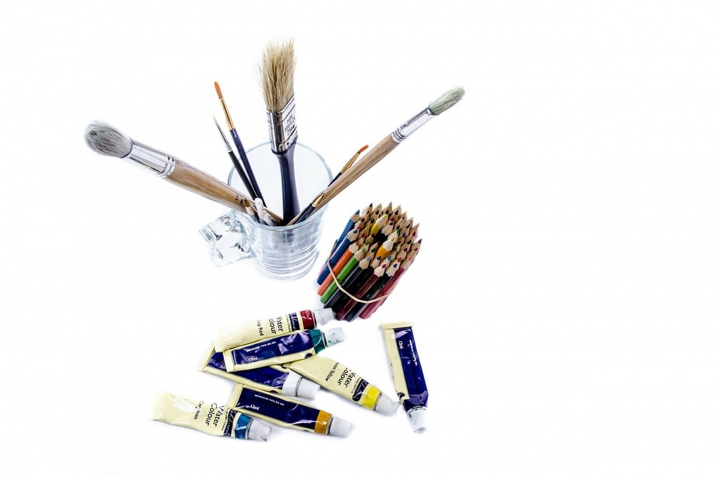 A white table topped with paint and brushes. Paint brushes painting. -  PICRYL - Public Domain Media Search Engine Public Domain Image