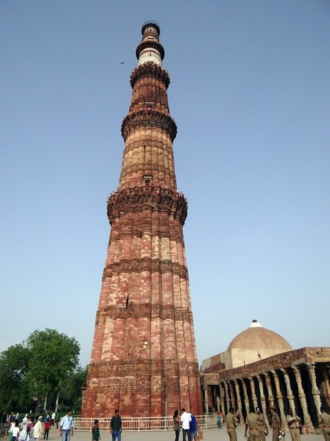 Qutb minar qutub minar qutab building. A tall tower with a clock on top ...