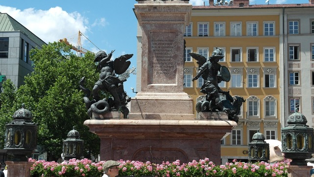 A Statue Of A Man Riding A Horse Next To A Building Statue Of Mary   Statue Of Mary Marienplatz Munich Architecture Buildings B1d3da 640 