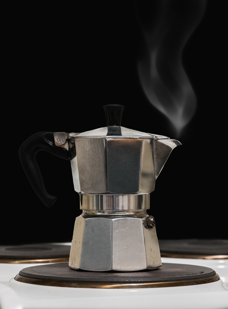 A silver coffee pot sitting on top of a pile of coffee beans. Coffee tea old  coffee maker, food drink. - PICRYL - Public Domain Media Search Engine  Public Domain Search