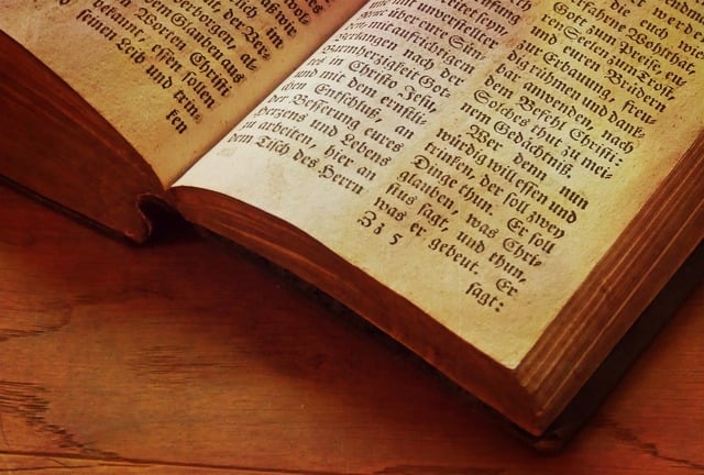 An open book sitting on top of a wooden table Texture background book ...