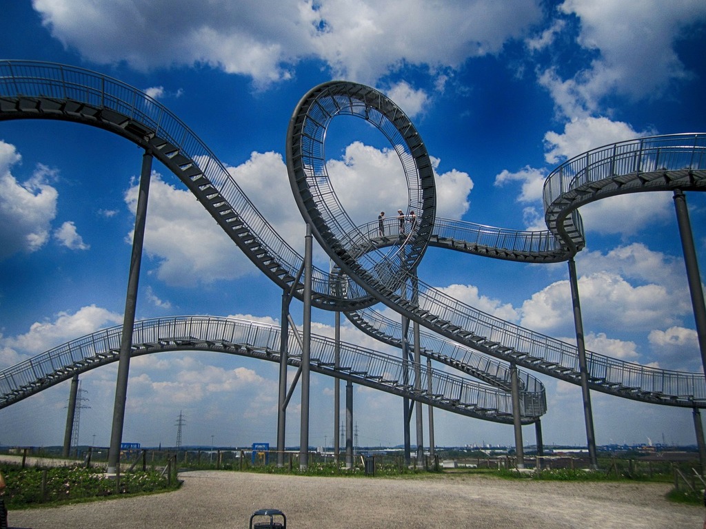 A roller coaster in the middle of a park Tiger and turtle duisburg