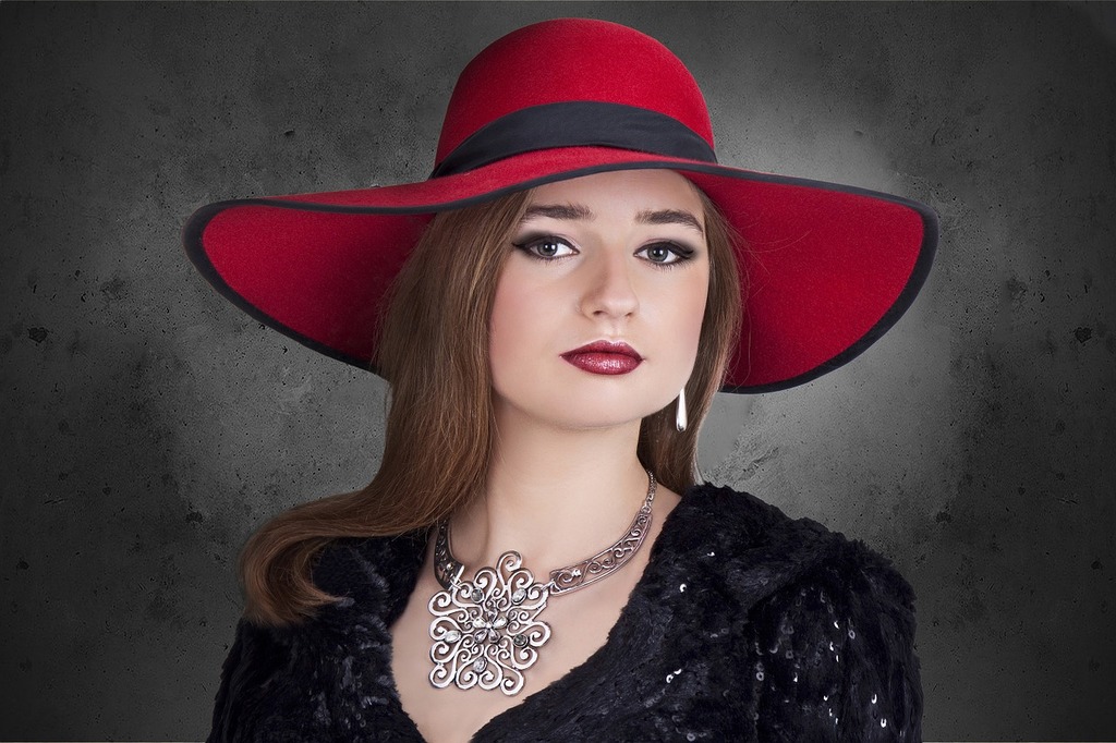 A woman wearing a red hat and a black dress. Woman hat the elegance, beauty  fashion. - PICRYL - Public Domain Media Search Engine Public Domain Search