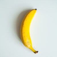 https://cdn12.picryl.com/thumbnail/2016/12/31/banana-yellow-white-background-568cf6-200.jpg