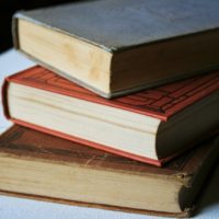 A person reading a book on the beach. Read reading open book. - PICRYL -  Public Domain Media Search Engine Public Domain Image