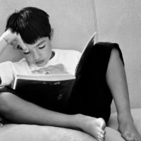 A person reading a book on the beach. Read reading open book. - PICRYL -  Public Domain Media Search Engine Public Domain Image