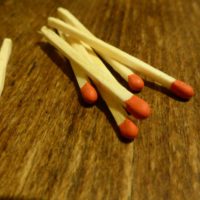 Some Stick Matches on a Wooden Table Stock Photo - Image of still,  vertical: 119307036